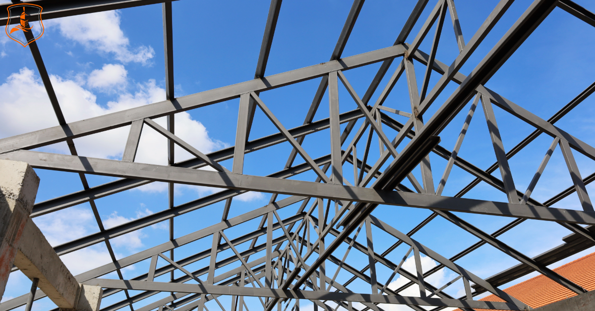Structural steel trusses forming a commercial building frame in Dallas–Fort Worth, Texas — representing Eastman Insurance Solutions’ insurance coverage for steel and ironworks contractors.